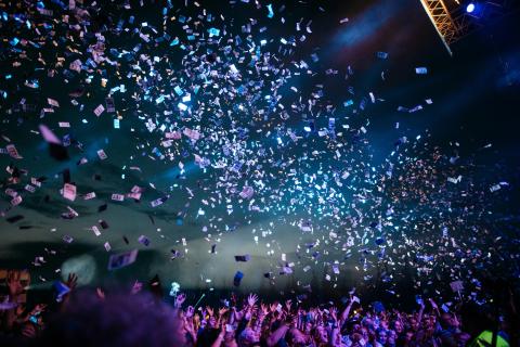 people partying with confetti by Pablo Heimplatz courtesy of Unsplash.